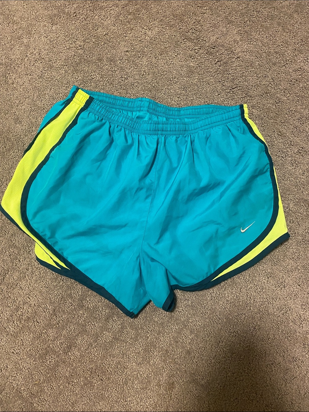 Nike Teal Running Shorts with Neon Yellow Accents